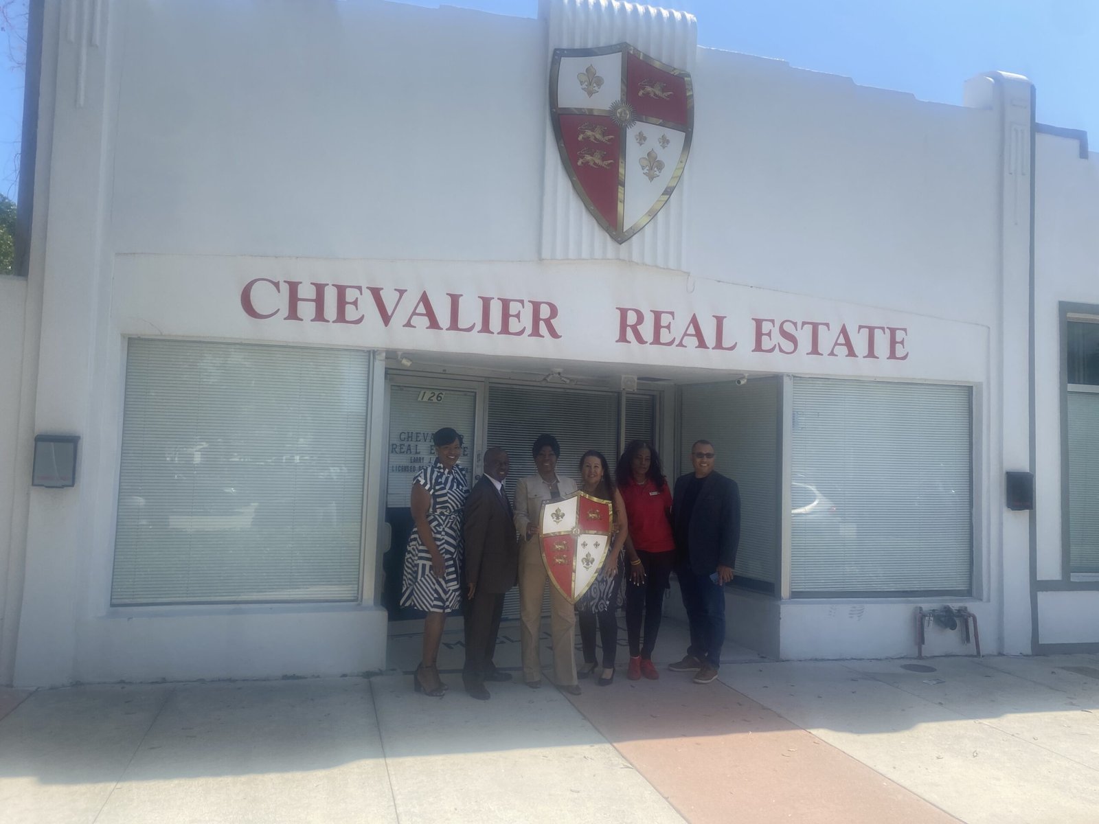 Agents outside Chevalier Real Estate scaled
