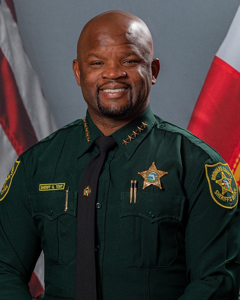 Official portrait of Broward Sheriff Gregory Tony wearing his sheriff's uniform.